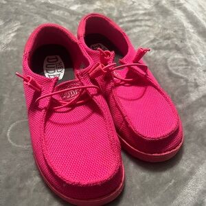 Hot pink HeyDudes. Lightly worn.